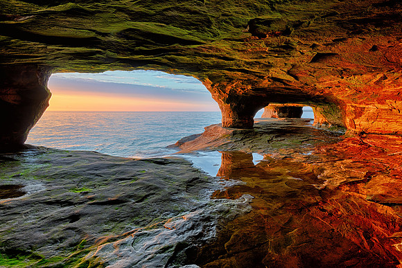 Sunlit Sea cave Lake Superior near Munising, Michigan