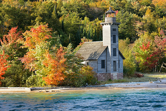 "Falls colors surround the Grand Island Lighthouse"