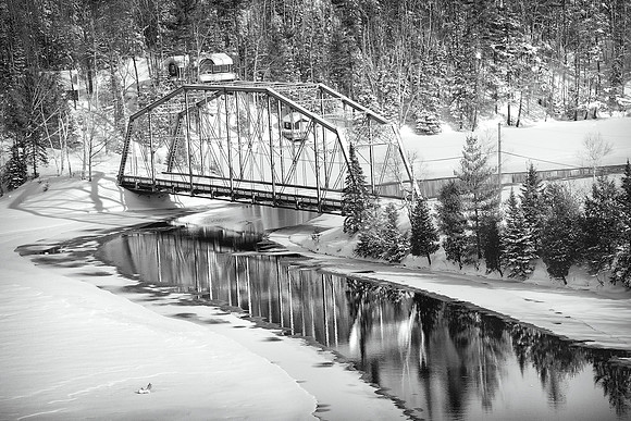 "Black and white winter  photo of an old Michigan bridge" bridg