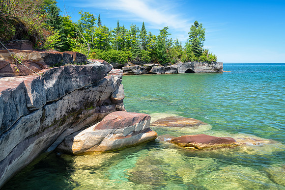 Lare rocks submerged in the clear waters of Lake Superior