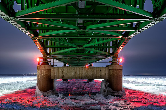 A winter view from under Mackinac Bridge