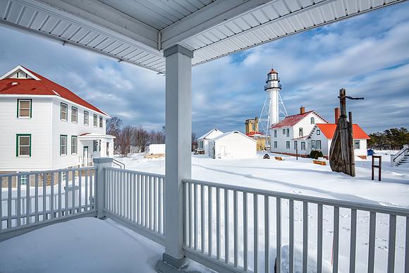 A porch view of Whitefish Point Lighthouse