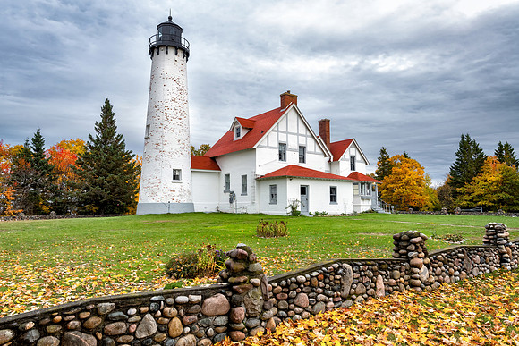 Point Iroquois Lighthouse on a moddy autumn day