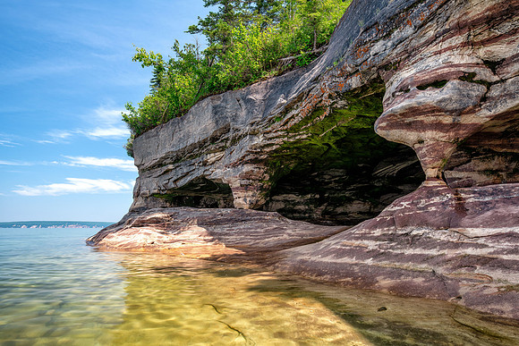 Wading the cool waters of Lake Superior for interesting angles of photography